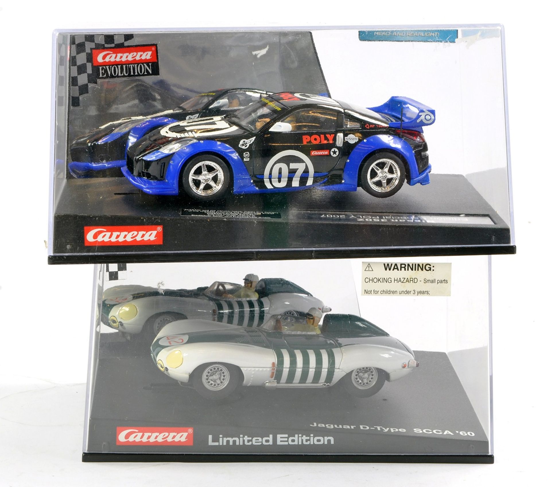 Slot Car Carrera 1/32 issues comprising No. 27197 Evolution Nissan 350Z and No. 25486 Jaguar D-Type.