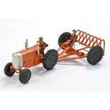 Crescent vintage tractor and rake set including figures. Orange with black wheels, silver trim.