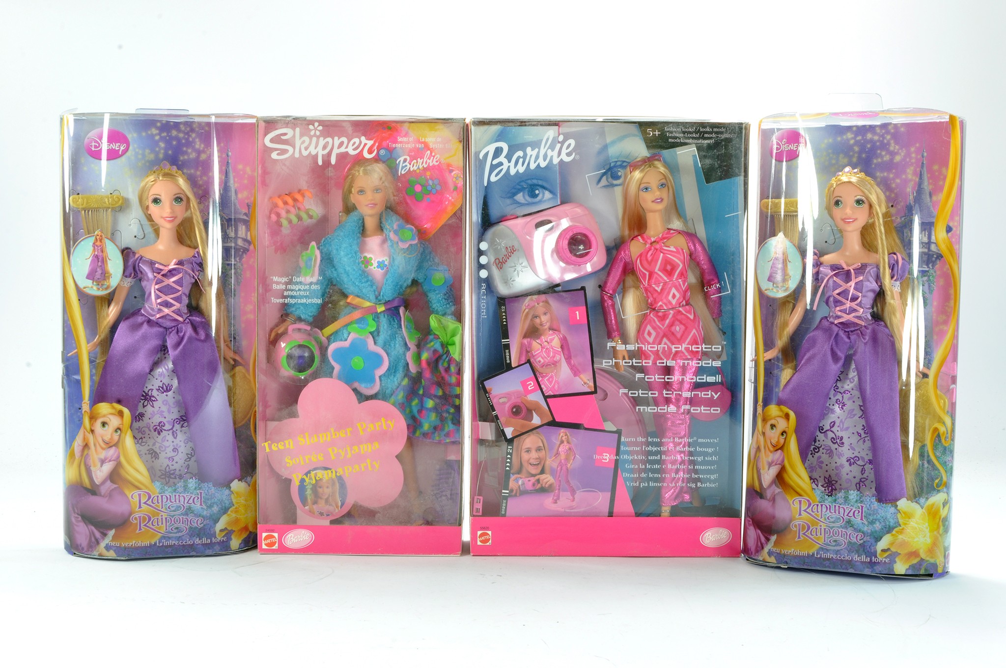 Fashion Dolls comprising Rapunzel duo plus Barbie Skipper and Fashion Photo. Excellent and unopened,