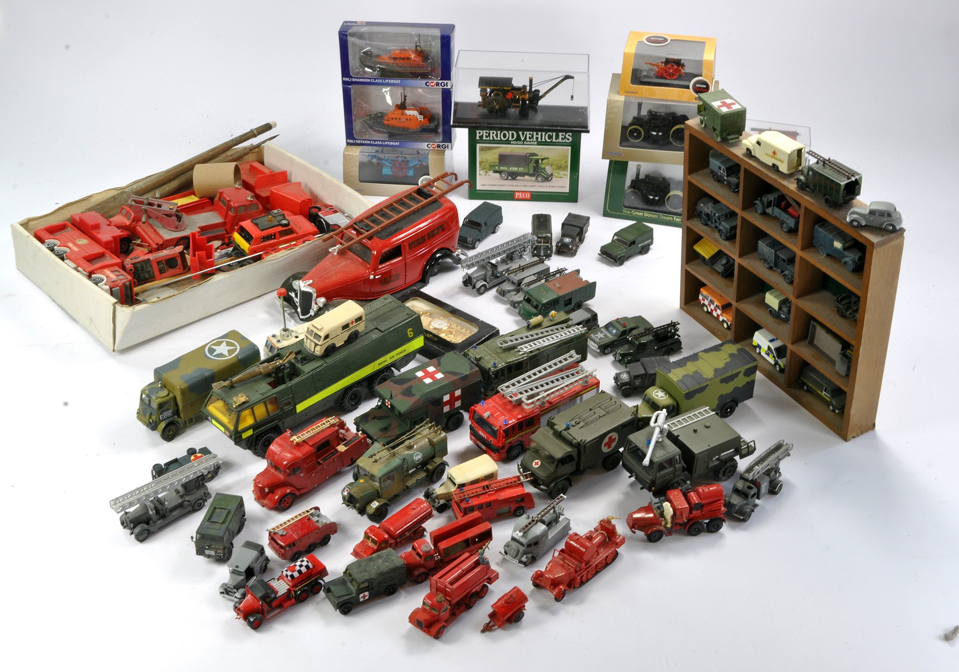 An interesting and large assortment of military themed model vehicles comprising diecast and plastic