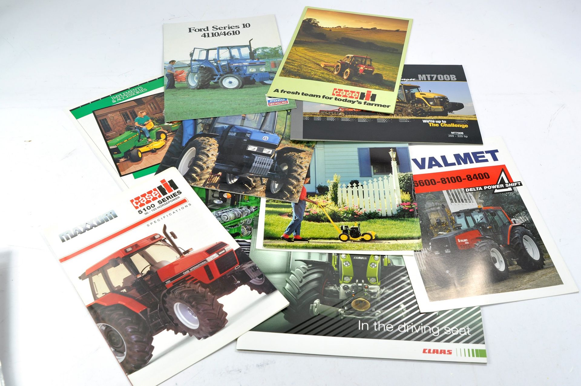 Tractor and Machinery Literature comprising sales brochures and leaflets from New Holland,