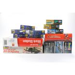 Twelve plastic model kits including Revell 1/32 Apache, Tamiya issues, Airfix Racing set and others.