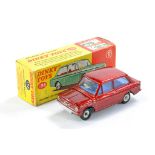 Dinky No. 138 Hillman Imp Saloon. Metallic red with blue interior and spun hubs. Excellent with