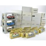 An assortment of 1/32 and 1/43 American themed classic cars from various makers including