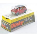 Dinky No. 183 Morris Mini Minor. Metallic Red with black roof. Ivory interior. Excellent, the odd