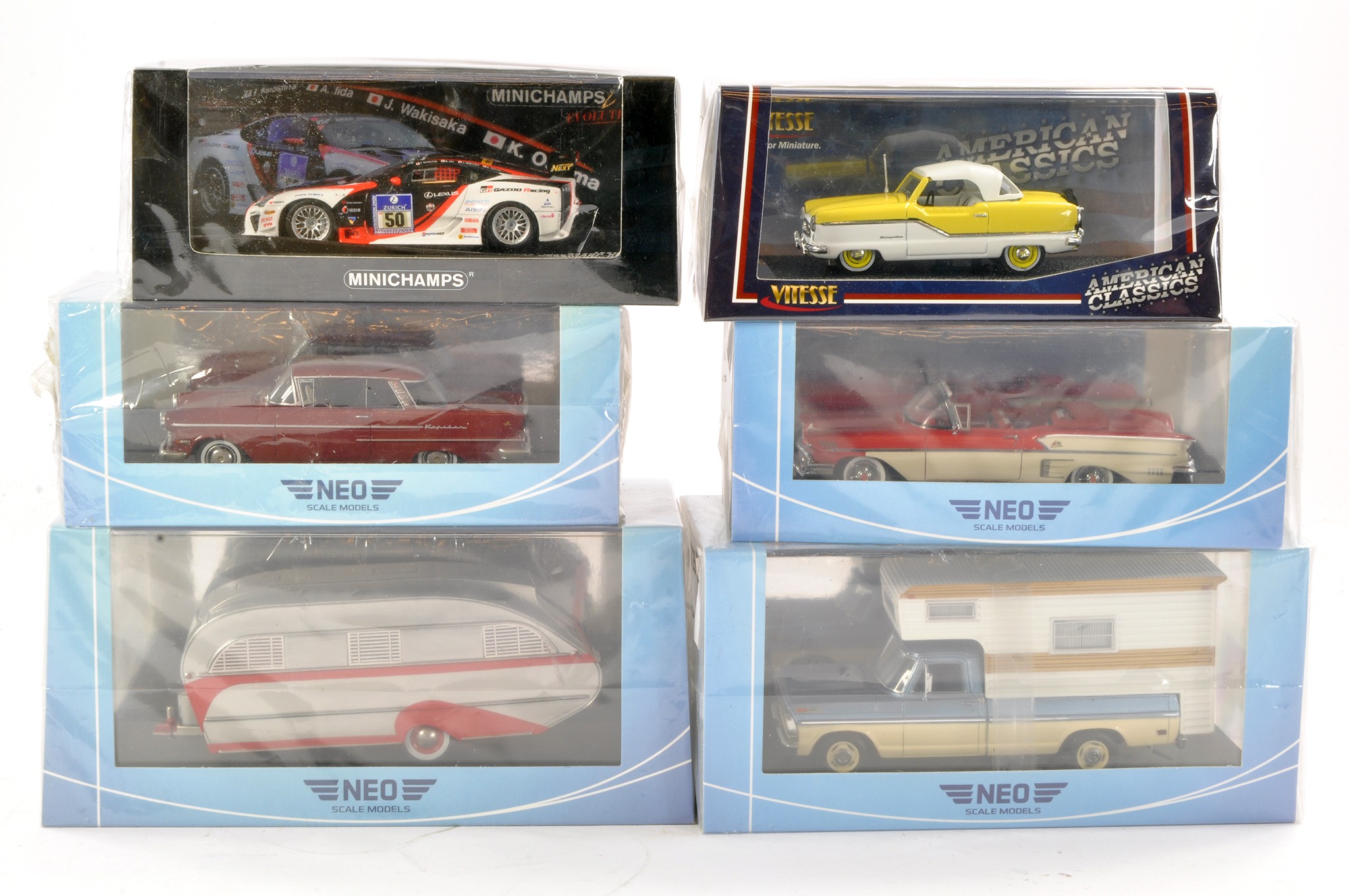 A group of four boxed scale models in 1/43 from Neo comprising Opel Kapitan, Caravan (loose part