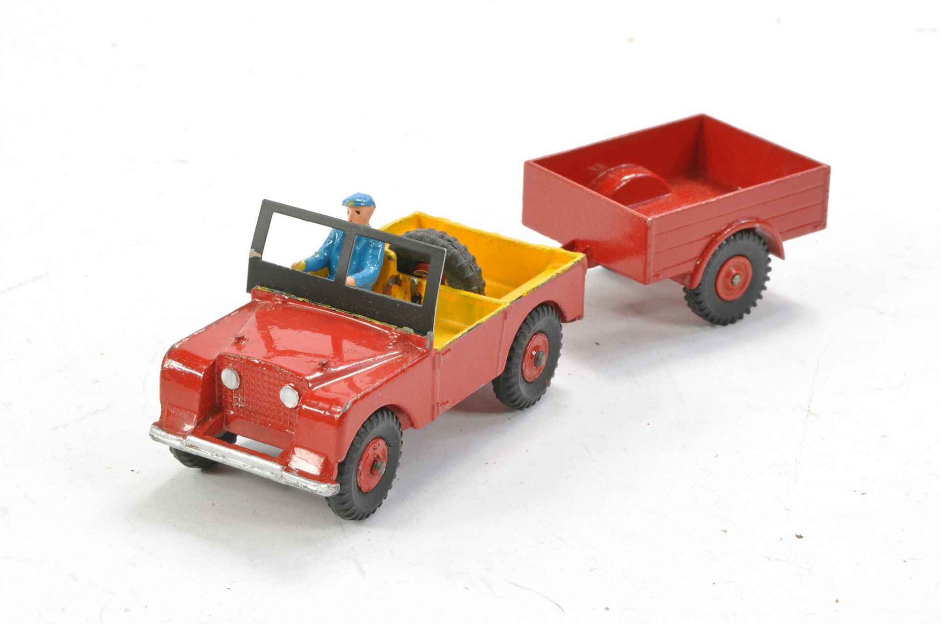 Dinky No. 340/341 Land Rover and Trailer. Red and yellow variant with blue driver. Land Rover