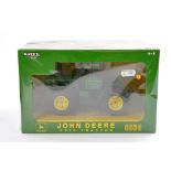 Britains Farm 1/32 issue comprising Plow City John Deere 8630 Tractor. Excellent, secure in box