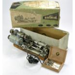 Elliott Unimat mini lathe with original box, fittings and accessories. With age but working.