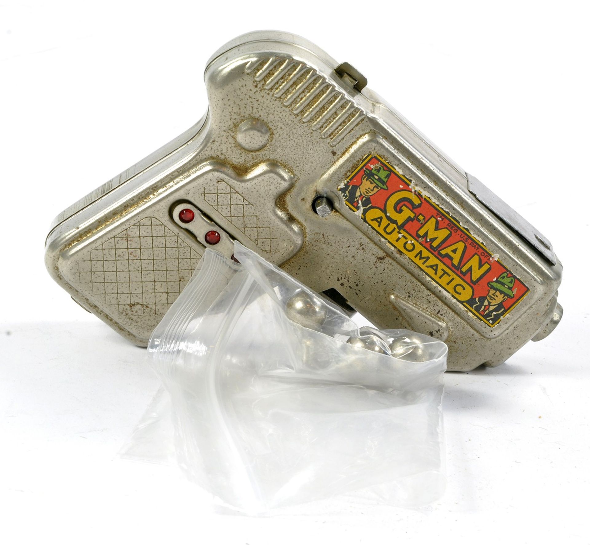 Marx G-Man Automatic Spark Firing Toy Pistol. Good, with marks and wear. In Good Working order.