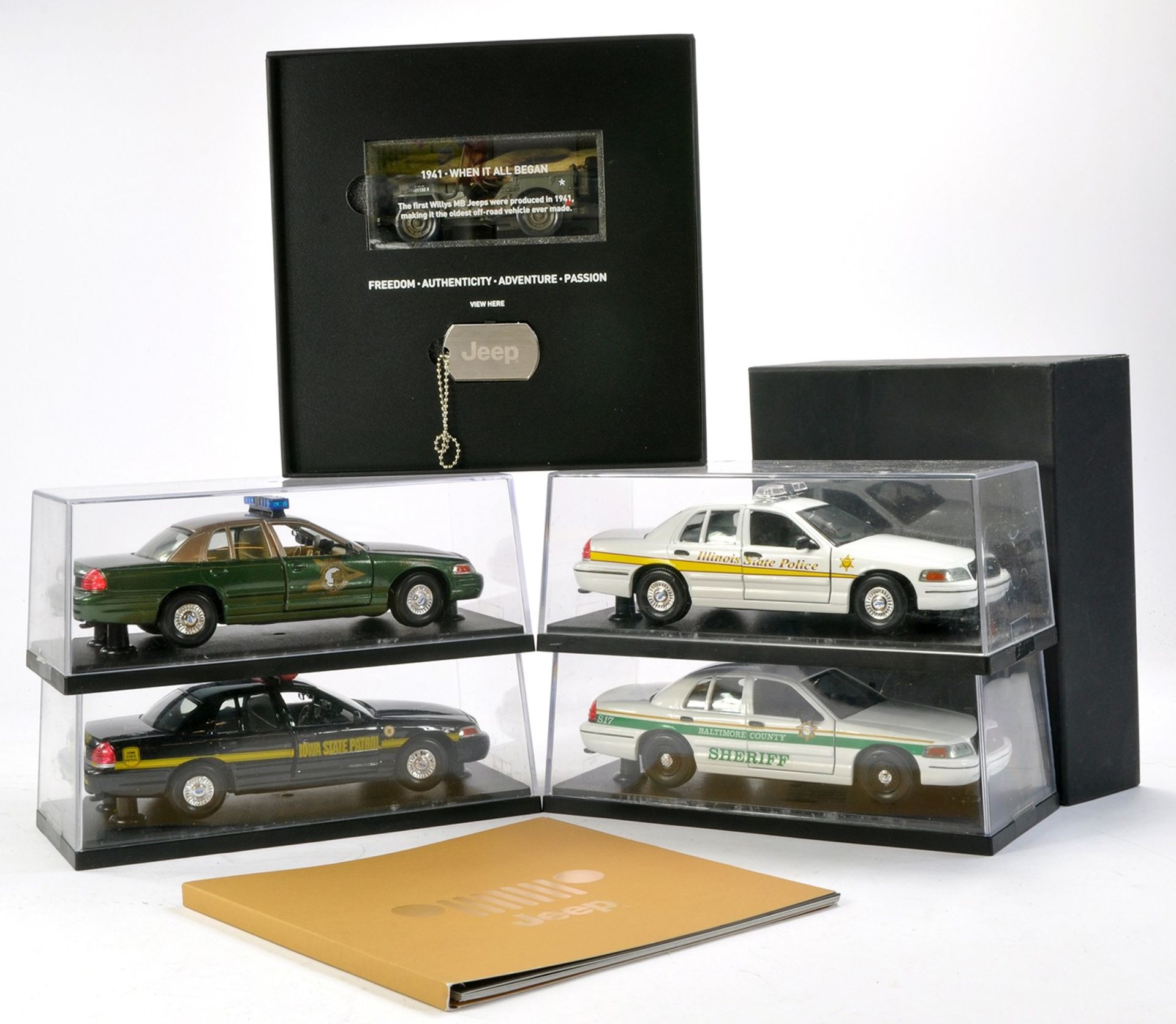 Four American Police Cars, approx. 1/18 plus 1/43 Limited Edition Jeep with presentation box.