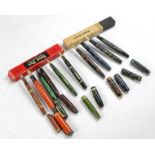 A selection of Vintage Cartridge Pens Parker Duofold in orange, Swan Self Filler(slight damage to