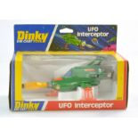 Dinky No. 351 UFO Interceptor. Darker metallic green but signs of restoration in later issue box.