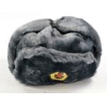 An authentic and vintage Soviet Ushanka as shown.