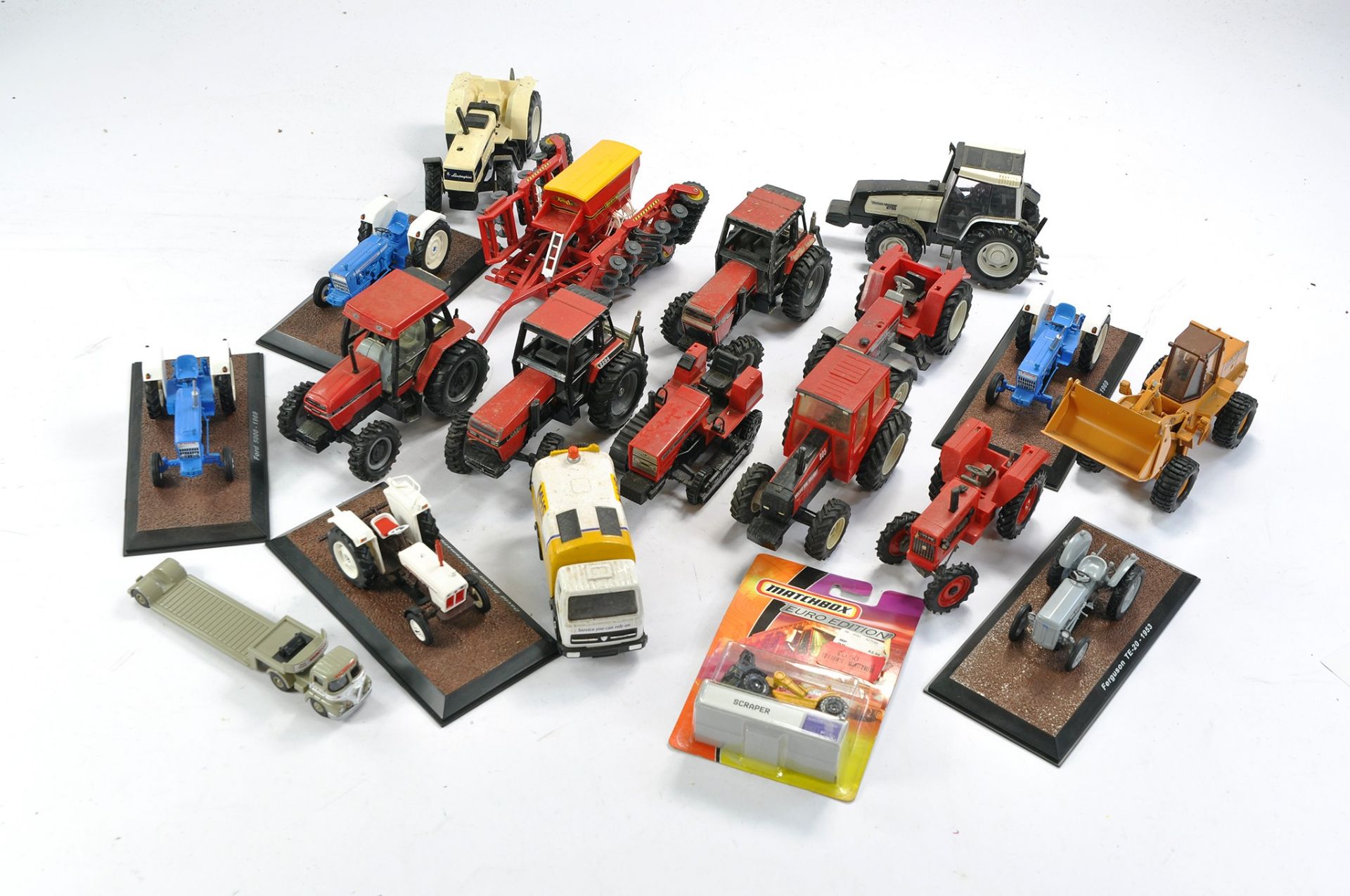 Assorted Tractor group including various worn Ertl and Britains issues plus selection of Atlas
