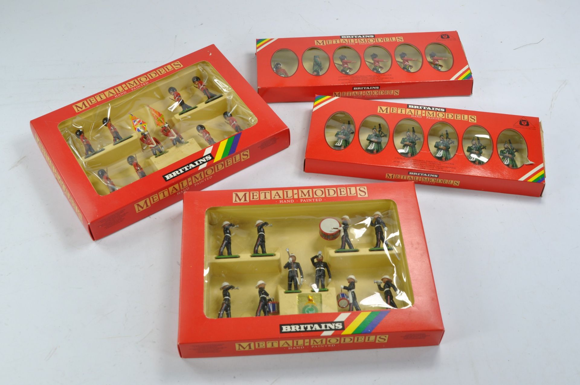 Four Britains Metal Soldier Sets as shown inc Gordan Highlanders. Excellent in boxes.