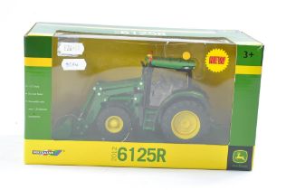 Britains Farm 1/32 issue comprising John Deere 6125R Tractor with loader. Excellent, secure in box