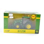 Britains Farm 1/32 issue comprising John Deere 6125R Tractor with loader. Excellent, secure in box