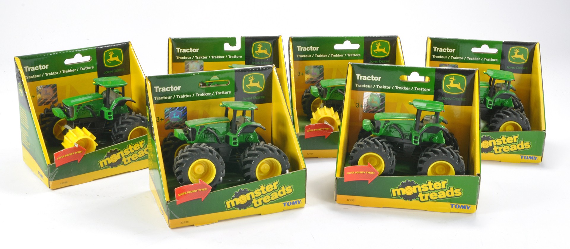 Group of Six Tomy John Deere Monster Treads. Some packaging with wear.