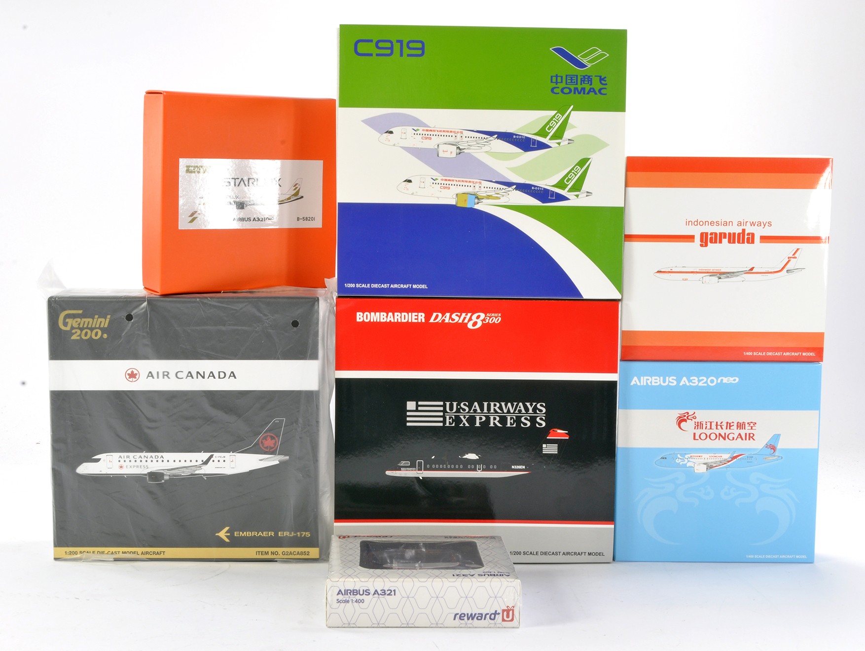 Model Aircraft comprising three 1/200 and four 1/400 boxed commercial airliners in various liveries.