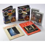 Various Star Wars collectibles comprising a duo of Tazo albums, duo of VHS videos and a duo of