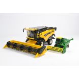 Britains 1/32 New Holland CX880 Combine plus Ertl 1/64 John Deere issue. Both very good.