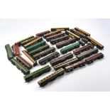 Group of model railway comprising various coaches. Looks to be mostly used, some in need of repair.