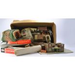 A group of various model railway buildings and accessories. Used and with signs of wear. From a