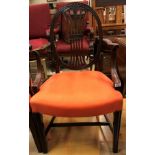 A set of six early 20th Century dining chairs in the Hepplewhite manner with oval backs and orange