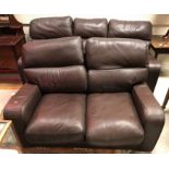 A G Plan "Ethos" brown leather three seat sofa and matching two seat sofa,