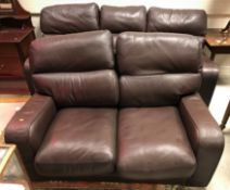 A G Plan "Ethos" brown leather three seat sofa and matching two seat sofa,