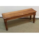A good quality modern cherry wood window seat in the Victorian style,