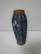 A Royal Doulton Lambeth Art Nouveau design floral relief work vase of hexagonal form,