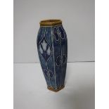 A Royal Doulton Lambeth Art Nouveau design floral relief work vase of hexagonal form,