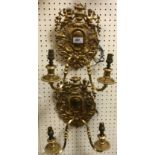 A pair of 20th Century gilt brass twin light wall sconces in the Rococo taste,