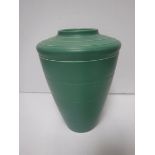 A Keith Murray for Wedgwood matt green glazed tapering vase with incised decoration,