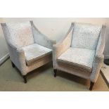 A set of four modern cream and taupe upholstered armchairs on turned front legs 75 cm wide x 68 cm