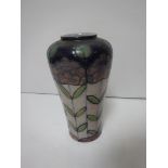 A Royal Doulton floral decorated baluster shaped vase,
