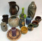 A collection of art pottery to include a Salkian Art Pottery dish with sgraffito decoration 19 cm
