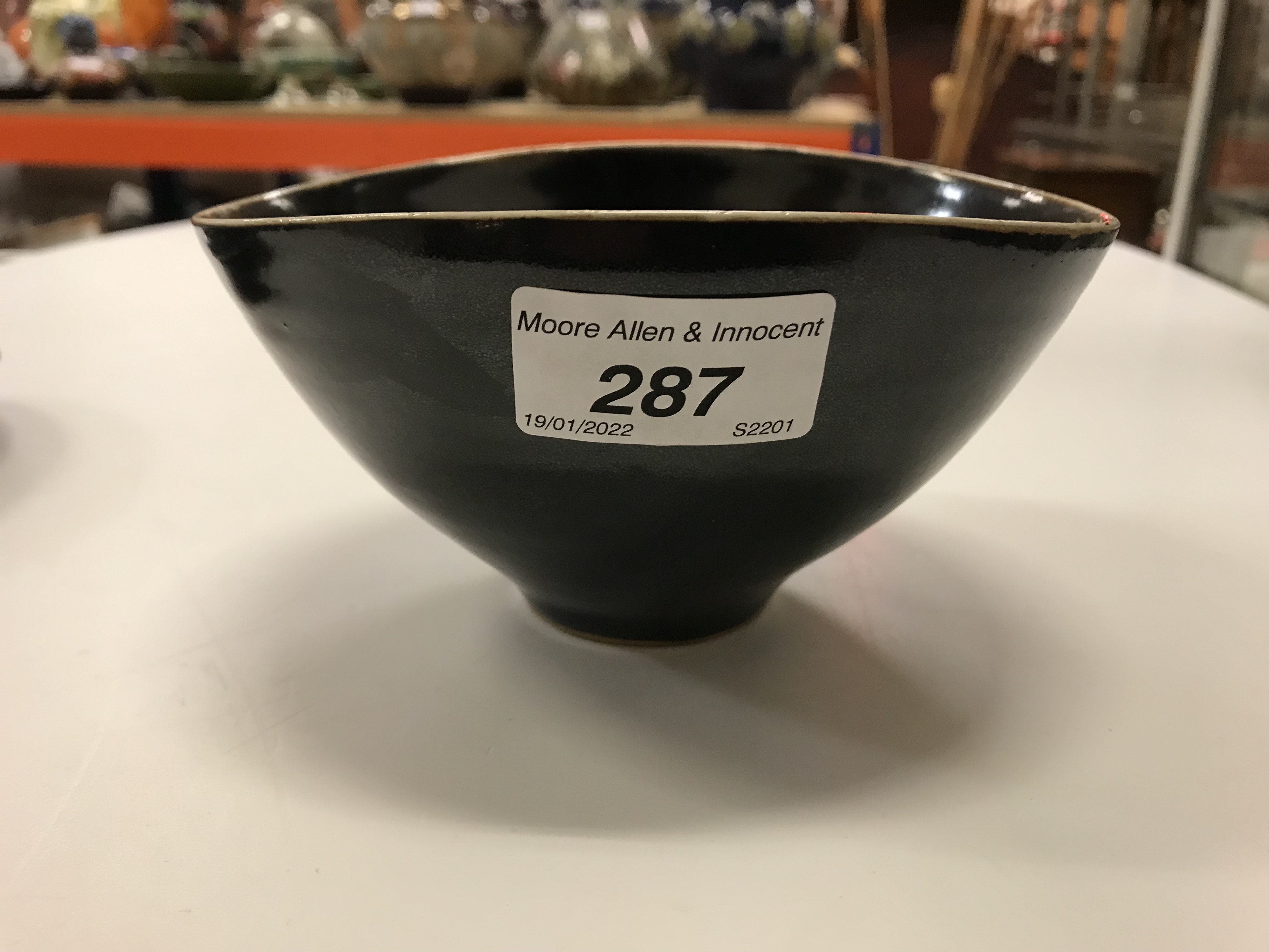 A Lucie Rie black glazed elliptical bowl and saucer, both bearing Lucie Rie marks, - Image 6 of 13