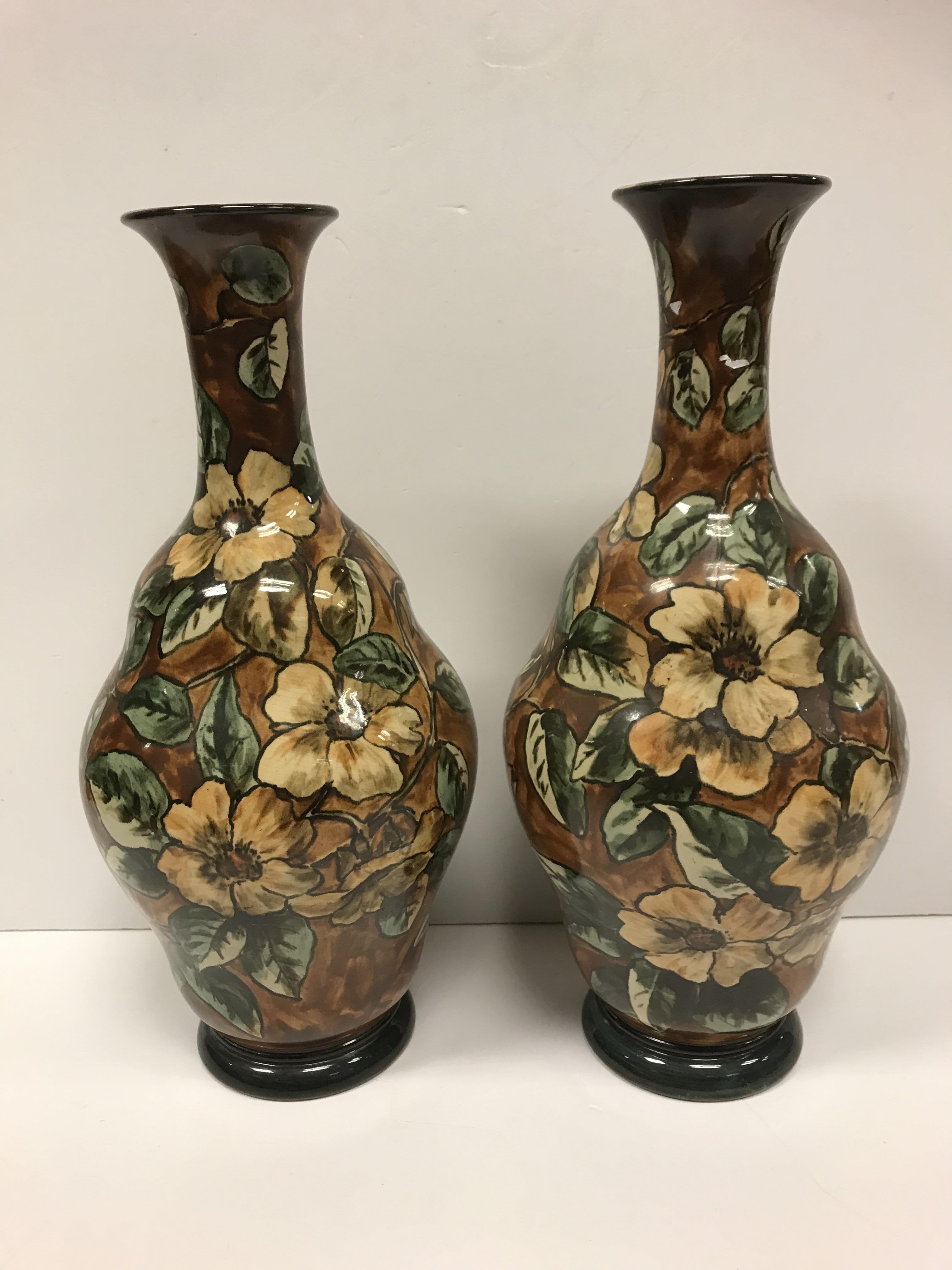 A pair of Doulton Lambeth faience ware vases, the brown ground set with floral decoration, - Image 2 of 22