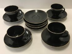 A set of four Lucie Rie and Hans Coper cups and saucers, all bar one cup double stamped,