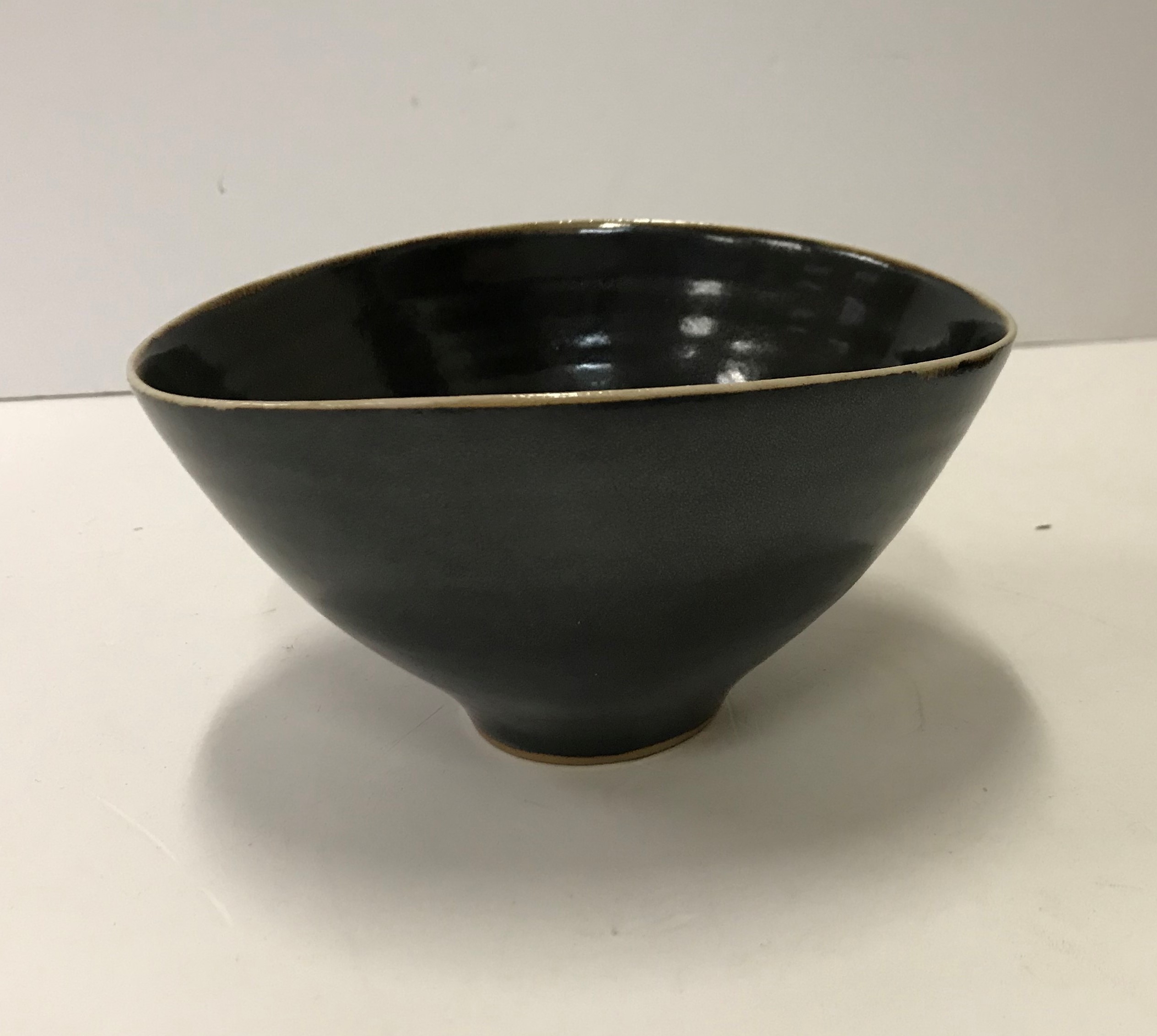 A Lucie Rie black glazed elliptical bowl and saucer, both bearing Lucie Rie marks, - Image 3 of 13