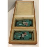 A cased pair of miniature cloisonné vases,