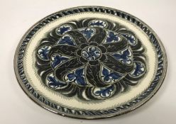 An Alfred Powell lustre ware plate,