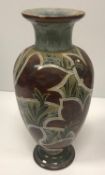 A Royal Doulton vase with Art Nouveau style floral incised decoration,