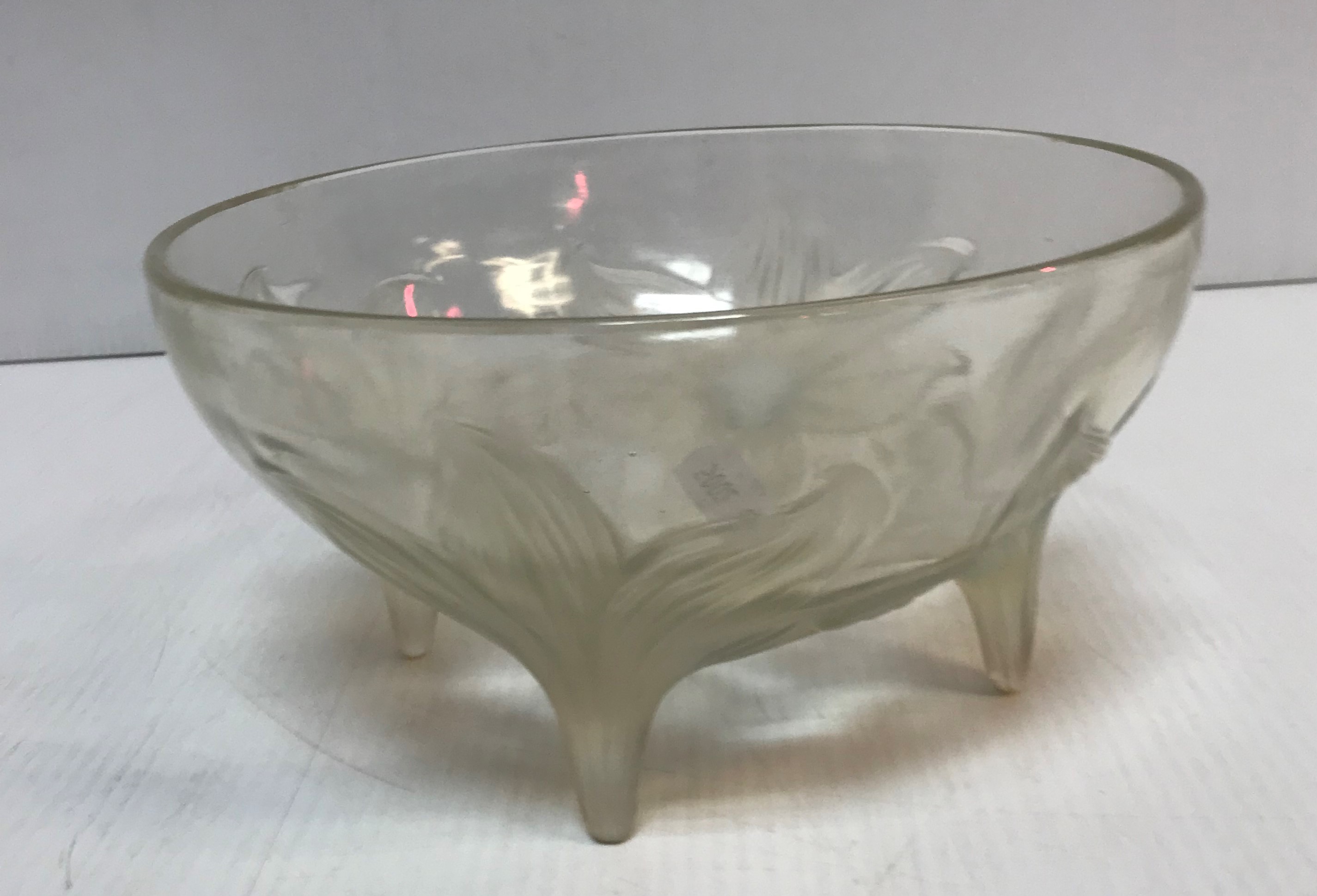 A Lalique “Lys” fruit bowl of typical form with opalescent floral decoration,
