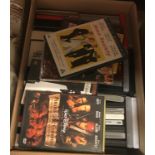 Two boxes of various DVDs,