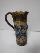 A Royal Doulton foliate relief work jug by Mark V Marshall,