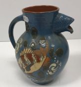 A C H Brannam Barum ware blue ground fish jug with fish head spout, No'd.